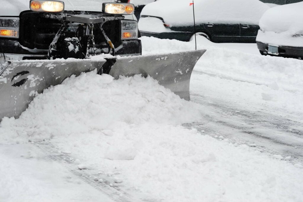 What is a Snow Squall? Here's Why They're So Dangerous 3 snow plow on road